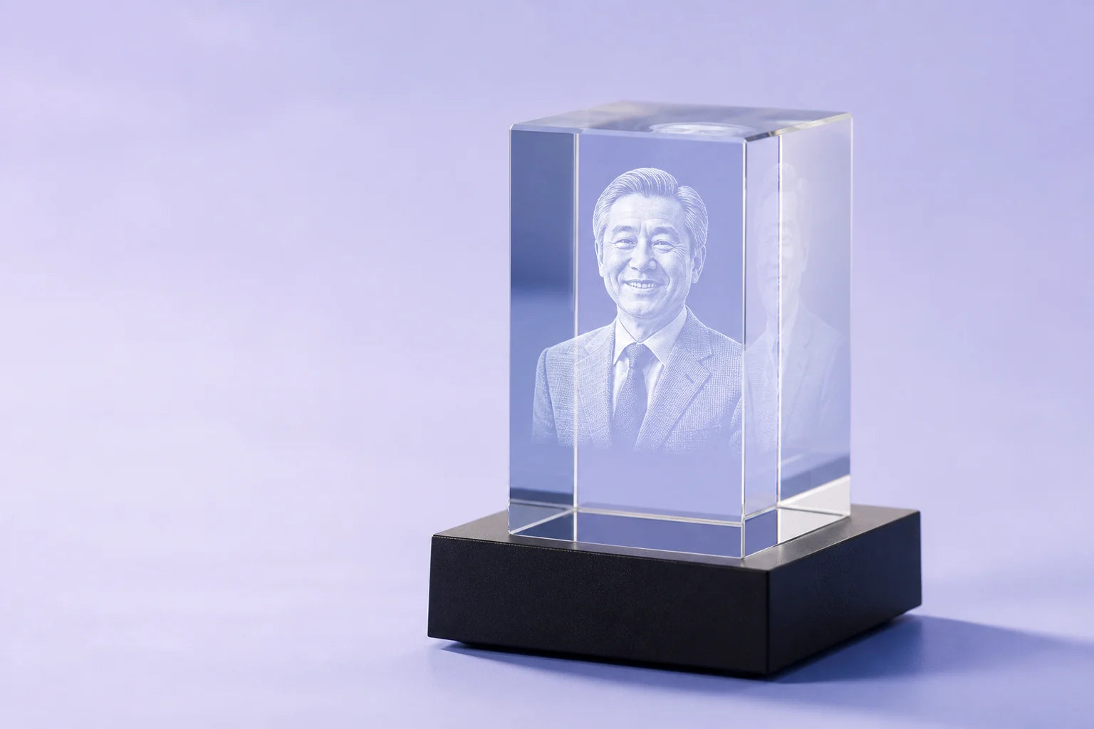A personalized 3D award made with the 50 x 80 x 50 mm small portrait crystal