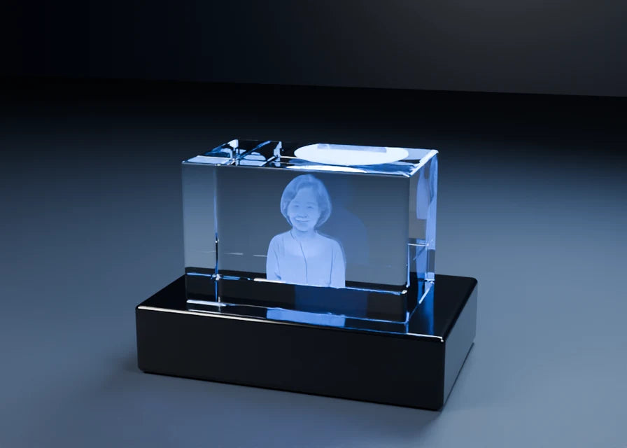 Product demonstration of a fictional portrait engraved in an illuminated 3D crystal