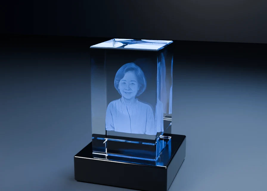 Product demonstration of a fictional portrait engraved in an illuminated 3D crystal